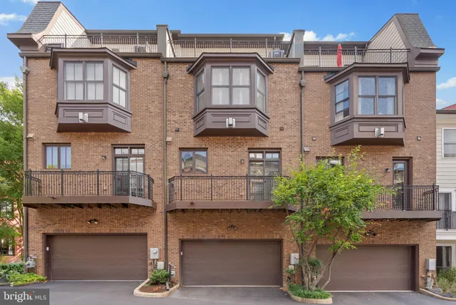 a view of swimming pool with outdoor seating and yard in back