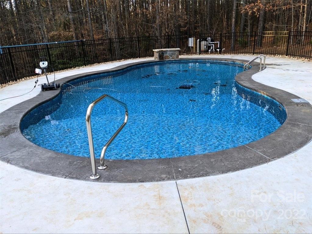 183 Pumkin Patch Road Rutherfordton, NC 28139 - Photo 3 of 3 a view of a swimming pool with a patio