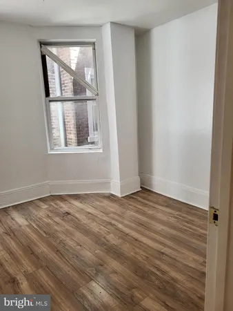 an empty room with window