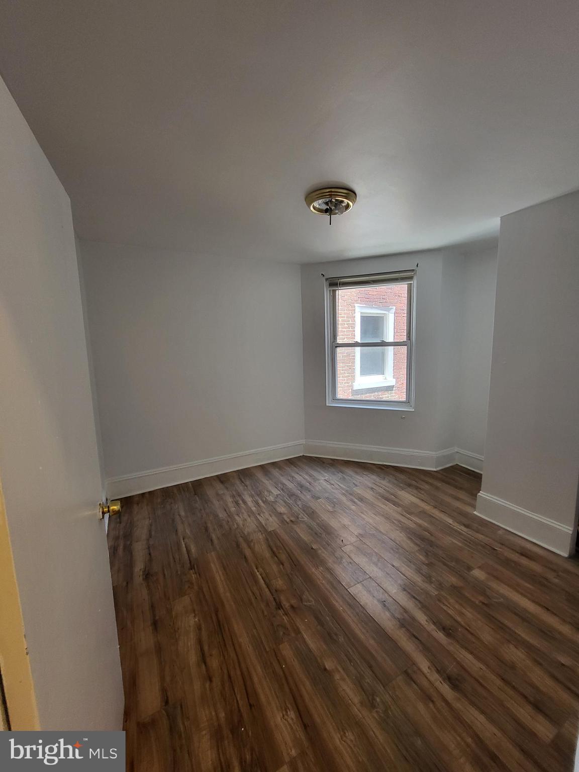 4834 Sansom Street, Unit 1 Philadelphia, PA 19139 - Photo 9 of 23 a view of a livingroom with a window