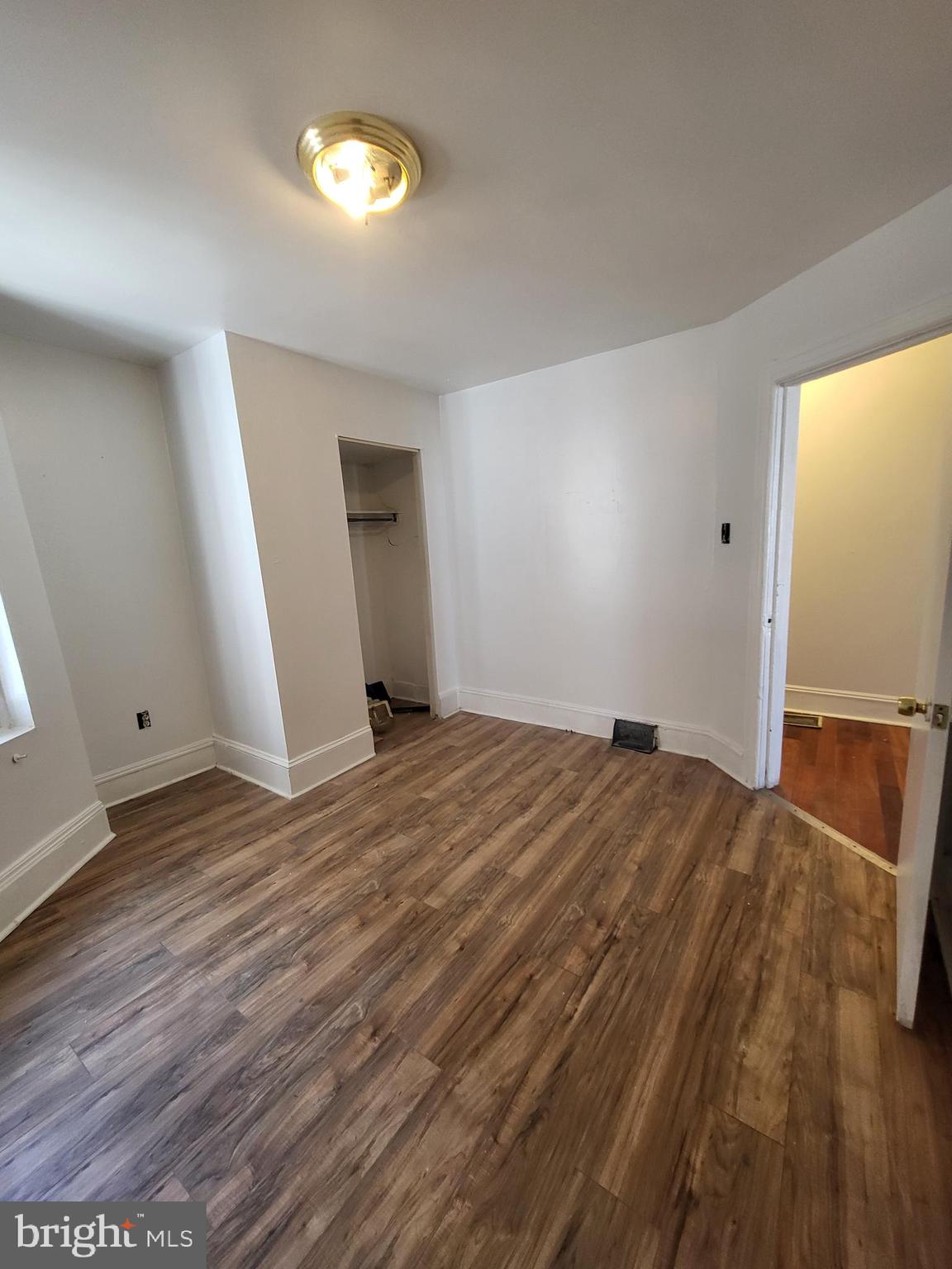 4834 Sansom Street, Unit 1 Philadelphia, PA 19139 - Photo 10 of 23 a view of empty room with wooden floor