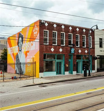 a view of a building on a street