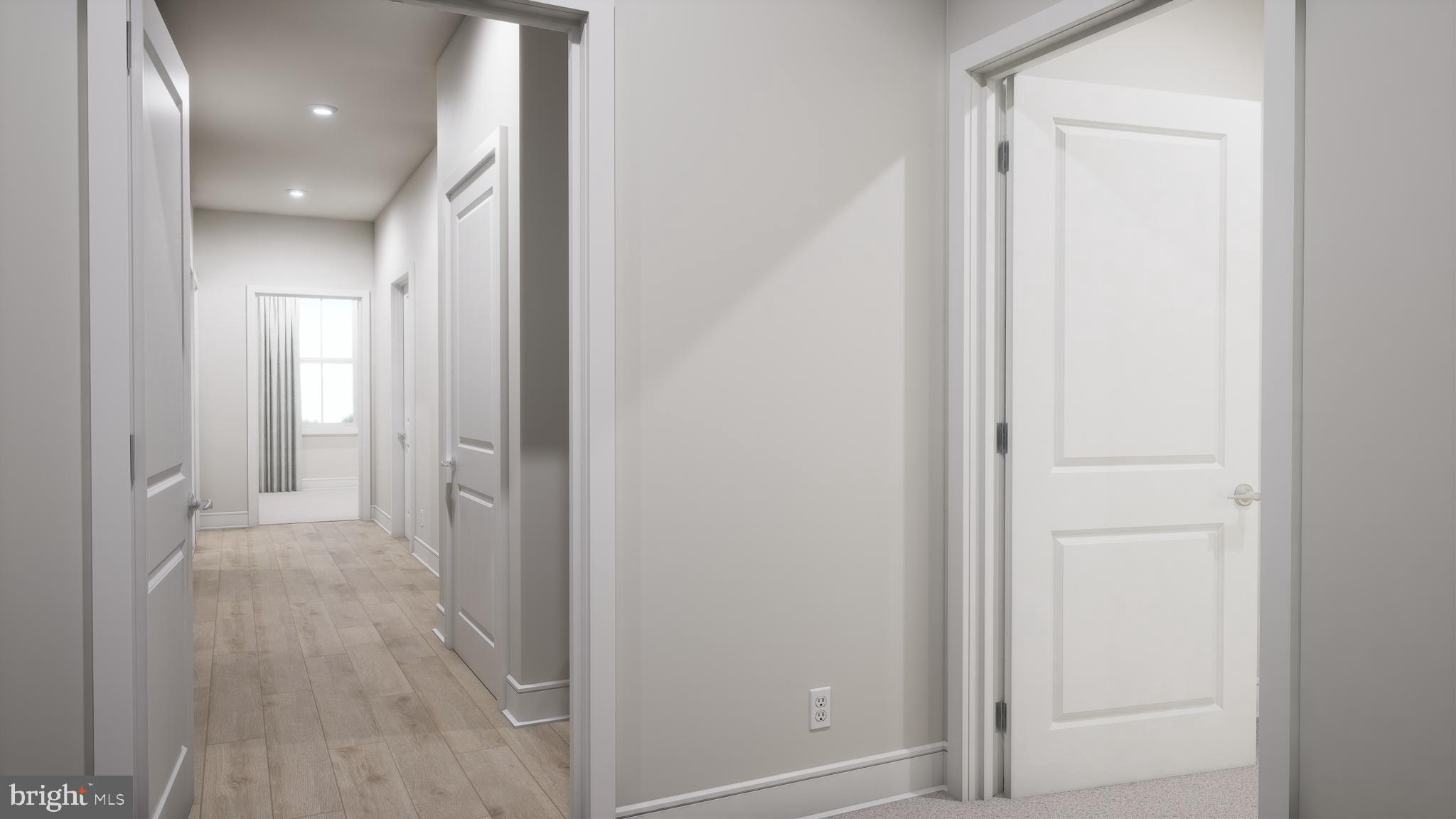 44476 Lowestoft Square Ashburn, VA 20147 - Photo 14 of 27 a view of a hallway with wooden floor
