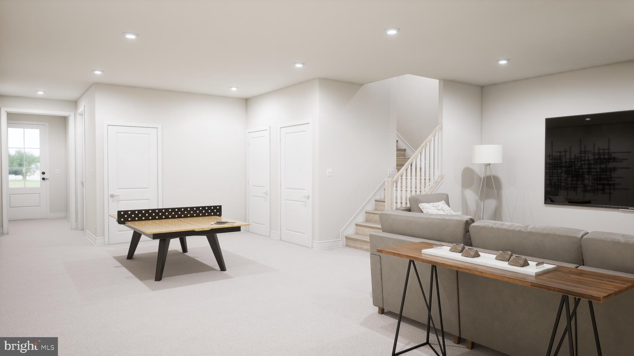 44476 Lowestoft Square Ashburn, VA 20147 - Photo 18 of 27 a living room with furniture and a flat screen tv