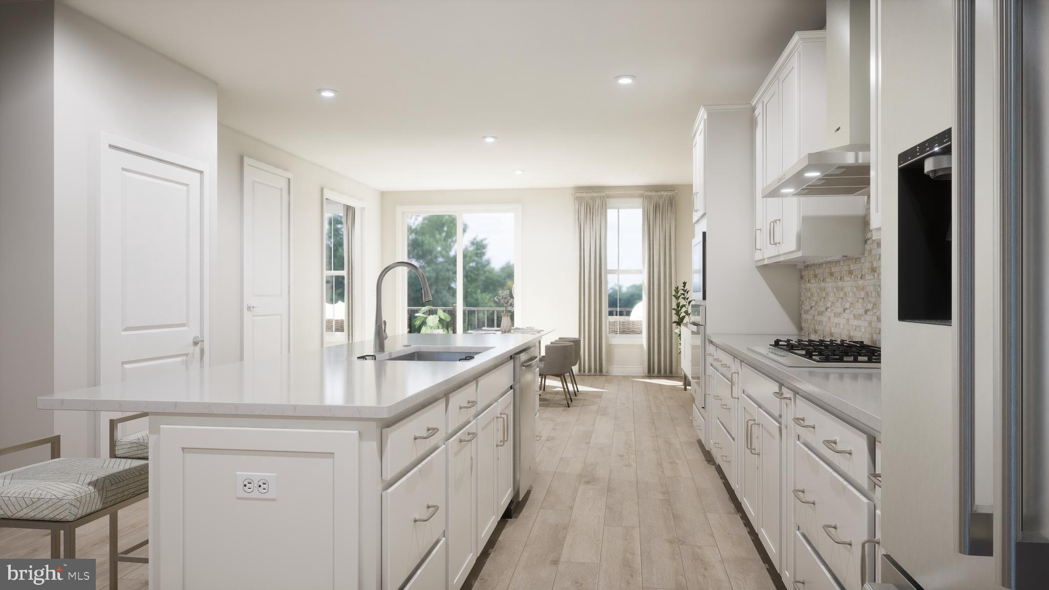 44476 Lowestoft Square Ashburn, VA 20147 - Photo 6 of 27 a large white kitchen with a large window