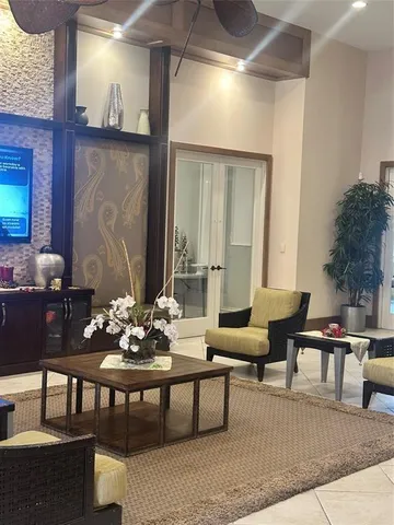 a view of a lobby with furniture