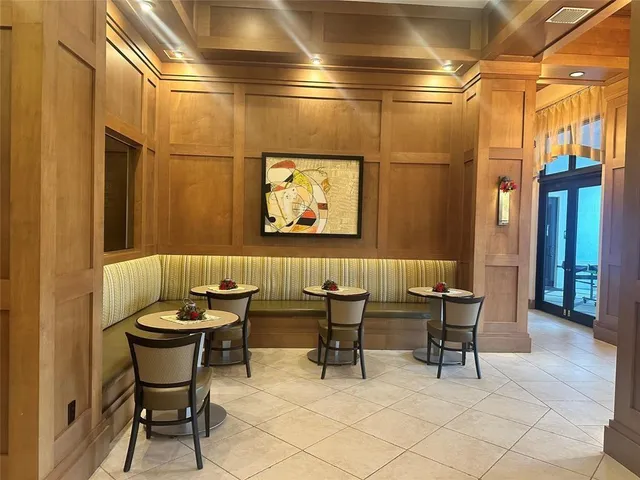 wooden floor with furniture and window