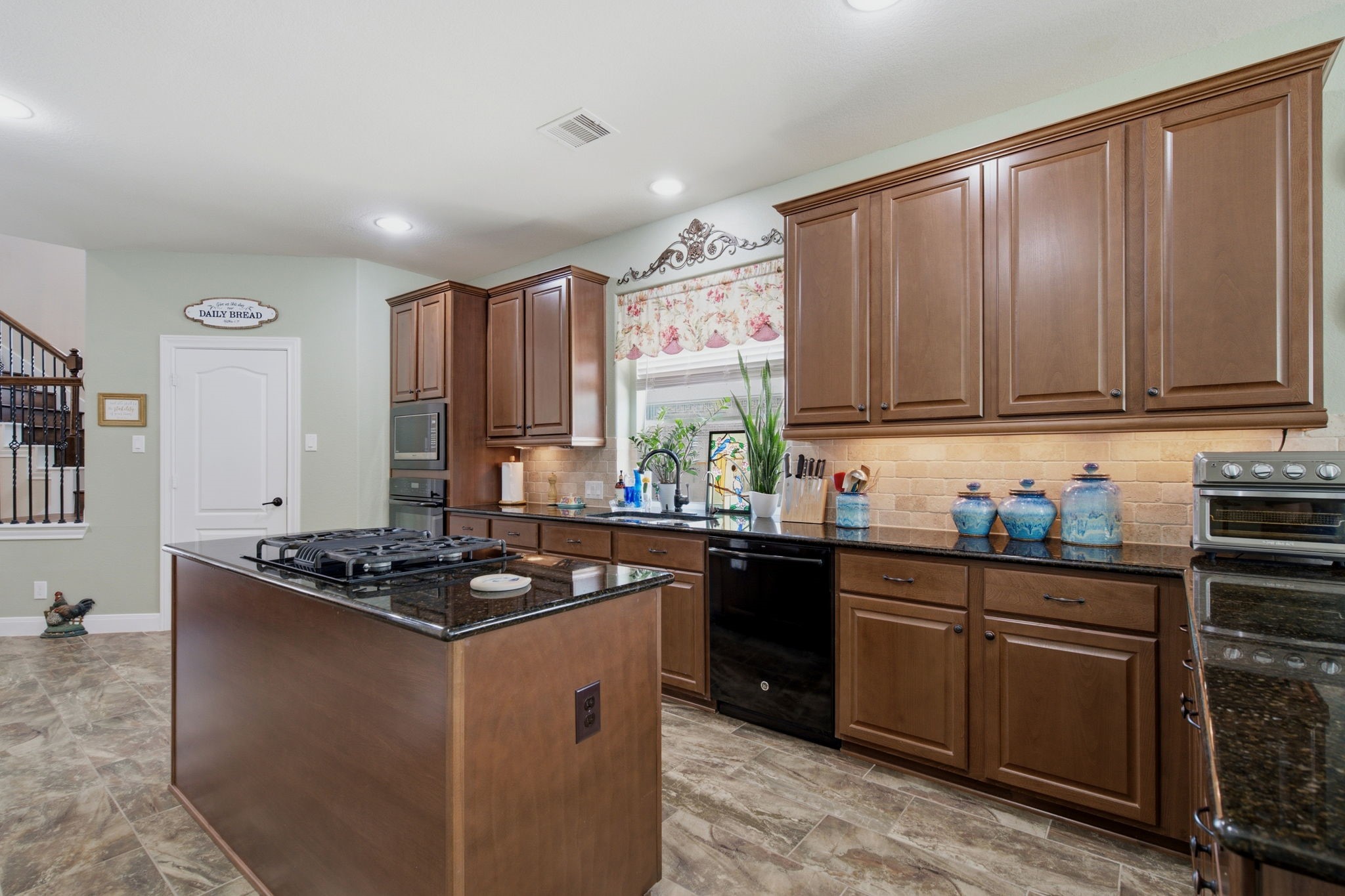 3298 Explorer Way Conroe, TX 77301 - Photo 12 of 43 KITCHEN HAS CABINETS FOR DAYS