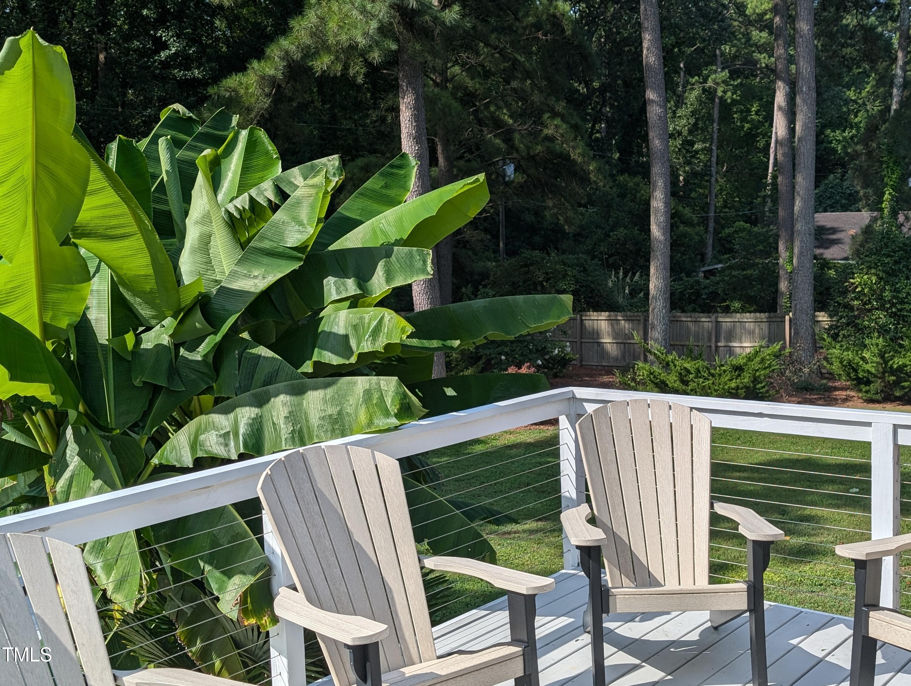 4008 Brown Place Raleigh, NC 27604 - Photo 14 of 14 a view of a chair and table in backyard of house