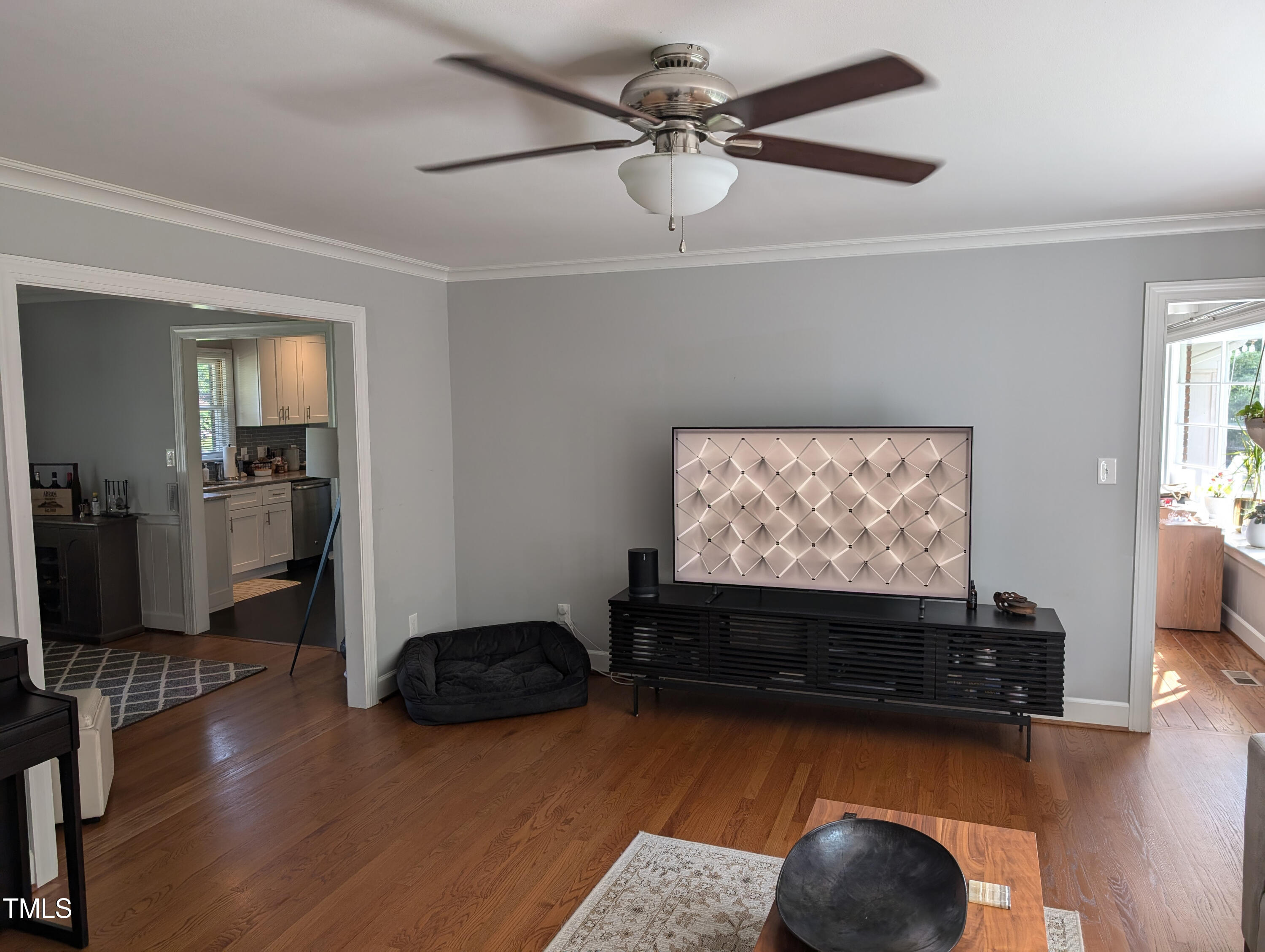 4008 Brown Place Raleigh, NC 27604 - Photo 7 of 14 a view of workspace with wooden floor and ceiling fan