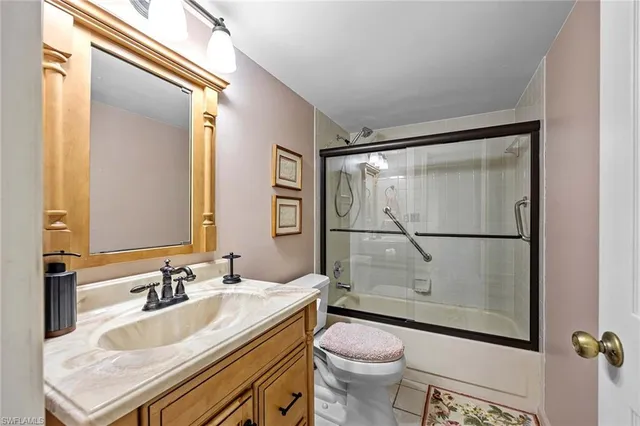 a view of a swimming pool with outdoor seating