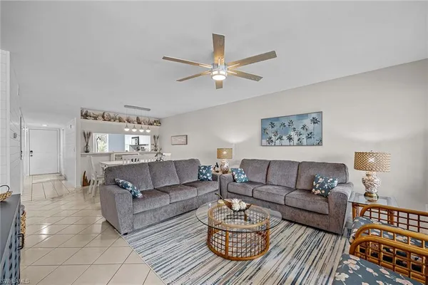 a bed room with furniture and a window