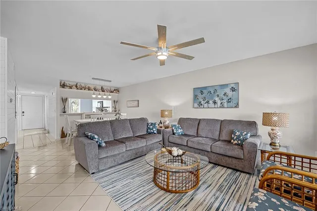 a bed room with furniture and a window