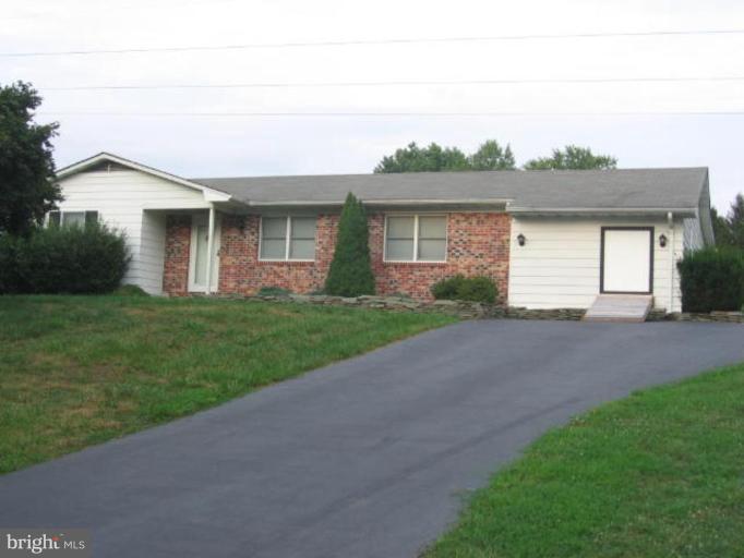 1205 Peachtree Road Fallston, MD 21047 - Photo 1 of 10 a front view of a house with a yard and garage