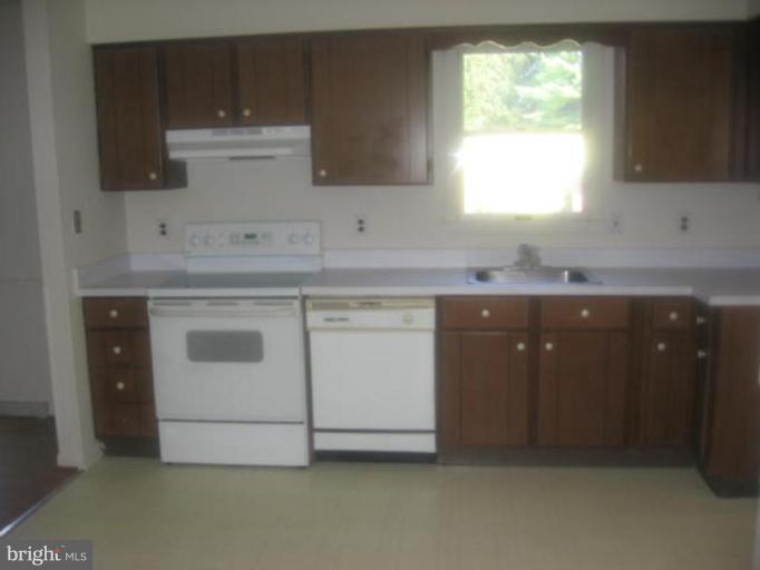 1205 Peachtree Road Fallston, MD 21047 - Photo 2 of 10 a kitchen with a sink and cabinets