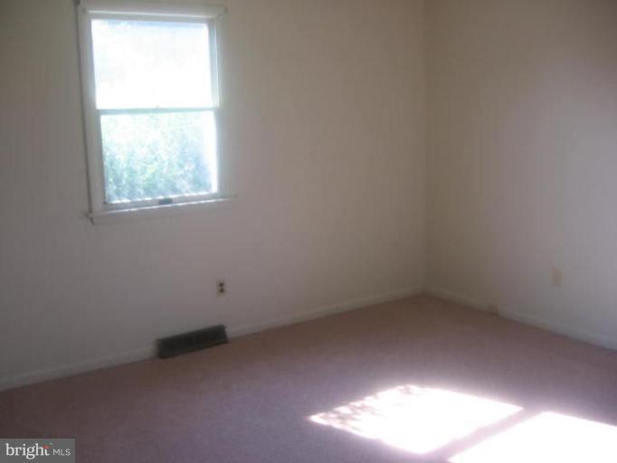 1205 Peachtree Road Fallston, MD 21047 - Photo 6 of 10 an empty room with a window