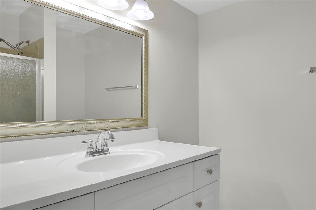 7801 Courtyard Run West Boca Raton, FL 33433 - Photo 17 of 31 a bathroom with a sink and a mirror