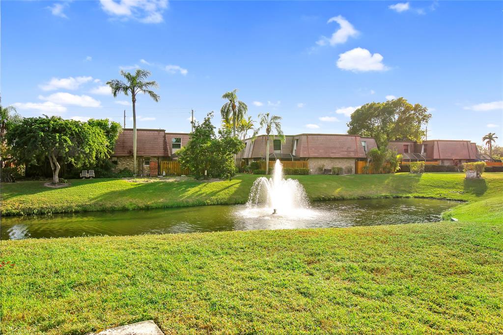 7801 Courtyard Run West Boca Raton, FL 33433 - Photo 28 of 31 a swimming pool view with a seating space