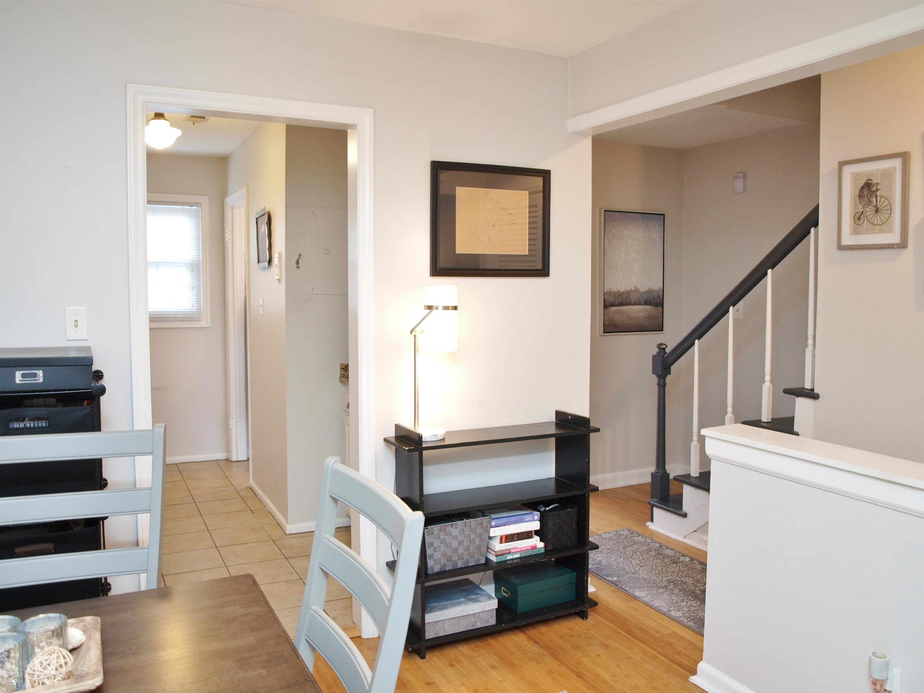 6313 New Market Way, Unit 6313 Raleigh, NC 27615 - Photo 9 of 18 a living room with furniture and a wooden floor