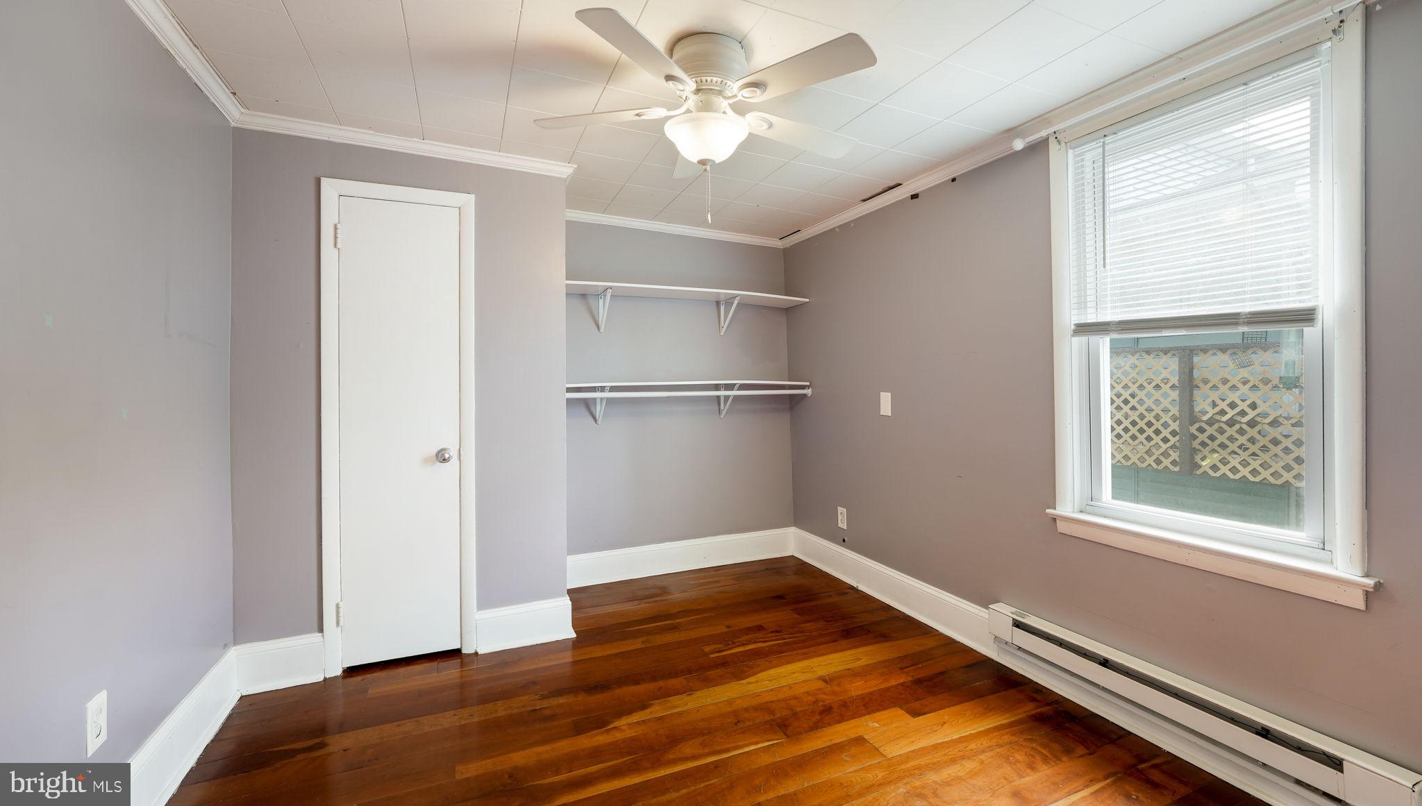 165 West Street Souderton, PA 18964 - Photo 12 of 31 a view of empty room with wooden floor and fan
