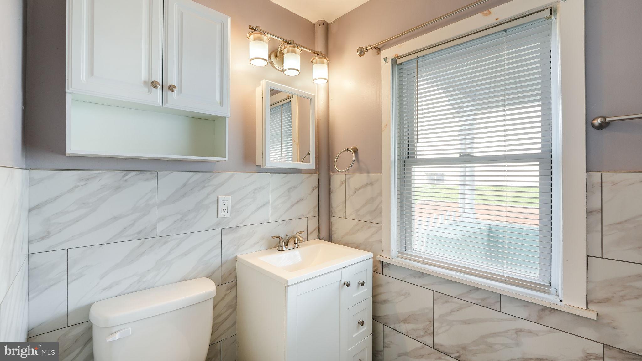 165 West Street Souderton, PA 18964 - Photo 16 of 31 a bathroom with a sink a toilet and a shower