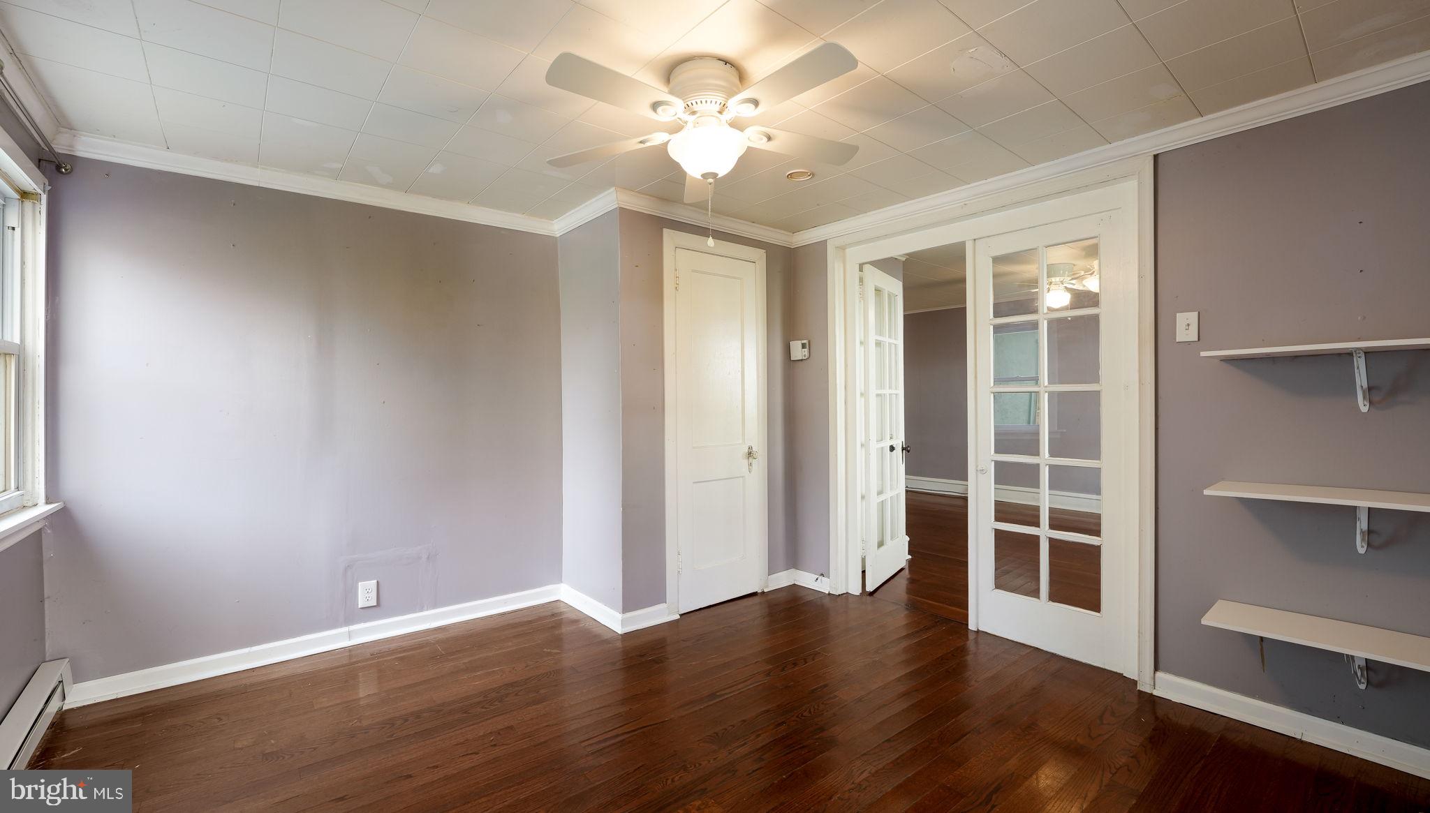 165 West Street Souderton, PA 18964 - Photo 8 of 31 wooden floor in an empty room with a window