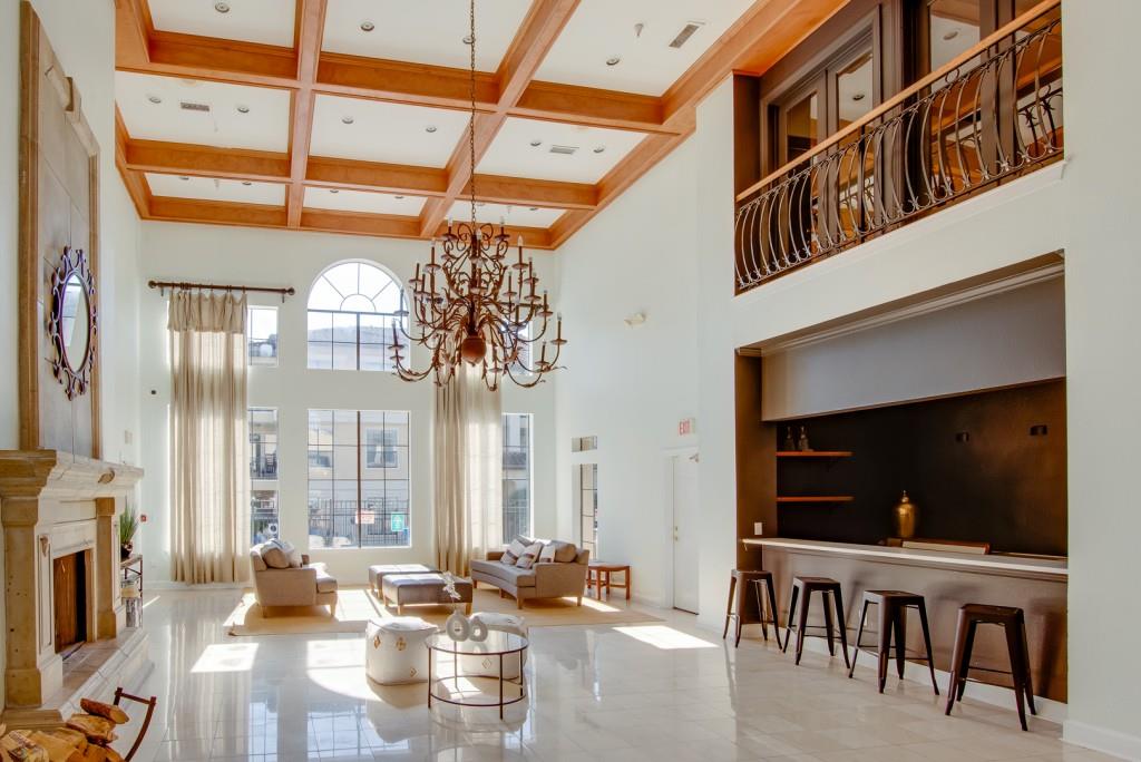 3777 Peachtree Road Northeast, Unit 1007 Brookhaven, GA 30319 - Photo 29 of 39 a living room with fireplace furniture and a flat screen tv