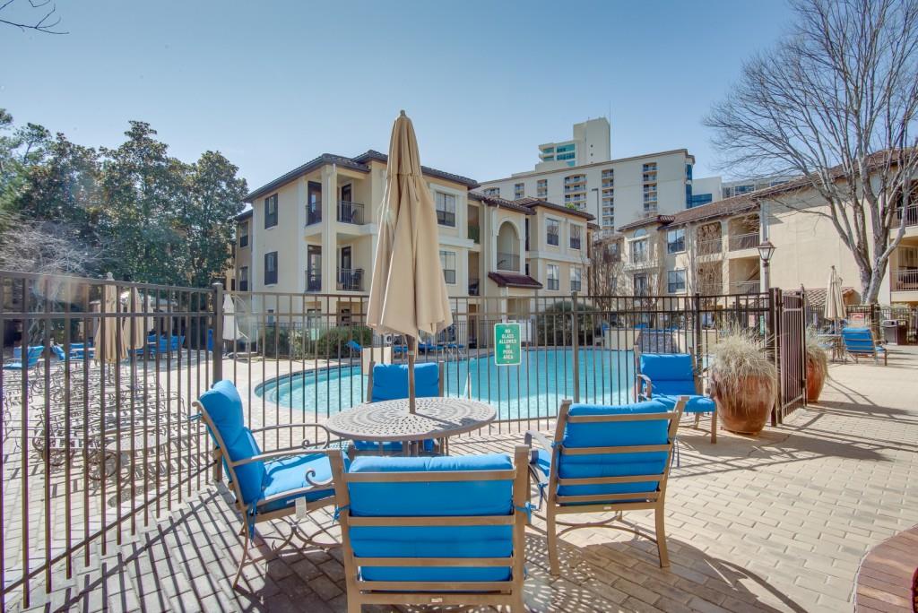 3777 Peachtree Road Northeast, Unit 1007 Brookhaven, GA 30319 - Photo 35 of 39 a view of a building with a bench
