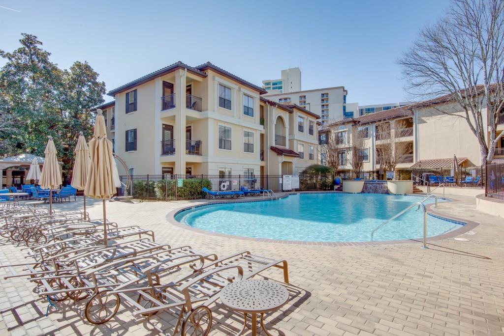 3777 Peachtree Road Northeast, Unit 1007 Brookhaven, GA 30319 - Photo 36 of 39 a front view of a house with a yard