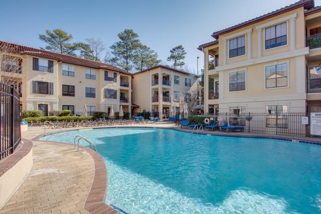 3777 Peachtree Road Northeast, Unit 1007 Brookhaven, GA 30319 - Photo 37 of 39 a view of a house with swimming pool and sitting area