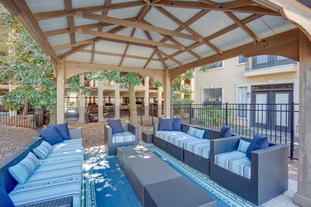 3777 Peachtree Road Northeast, Unit 1007 Brookhaven, GA 30319 - Photo 38 of 39 a living room with furniture and a large window