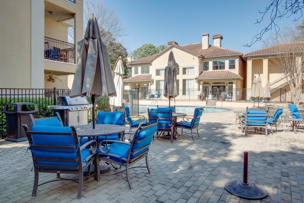 3777 Peachtree Road Northeast, Unit 1007 Brookhaven, GA 30319 - Photo 39 of 39 a view of dinning table and chairs in the patio