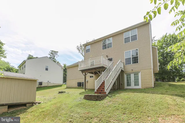 a house view with a backyard space
