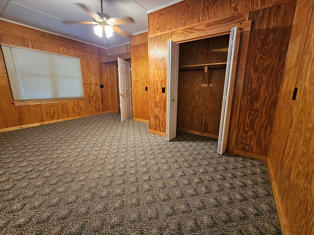 1705 Homer Wright Road Talking Rock, GA 30175 - Photo 11 of 98 a view of a hallway with wooden floor and a bathroom