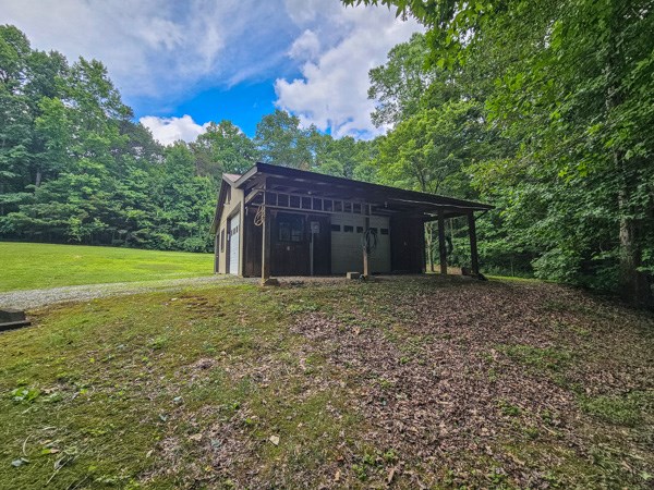 1705 Homer Wright Road Talking Rock, GA 30175 - Photo 38 of 98 a view of a house with backyard and tree