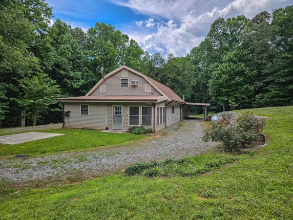 1705 Homer Wright Road Talking Rock, GA 30175 - Photo 44 of 98 a front view of a house with a yard