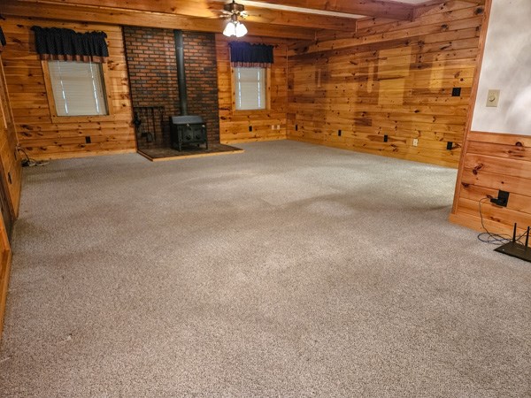 1705 Homer Wright Road Talking Rock, GA 30175 - Photo 57 of 98 a view of an empty room with a fireplace