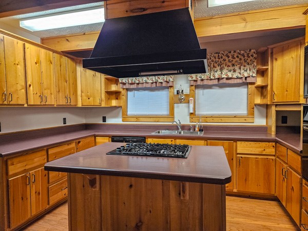 1705 Homer Wright Road Talking Rock, GA 30175 - Photo 58 of 98 a kitchen with a stove and a microwave