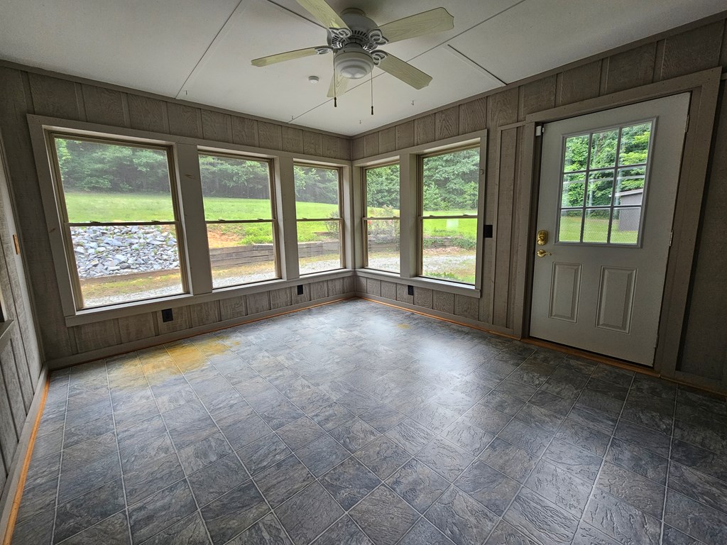 1705 Homer Wright Road Talking Rock, GA 30175 - Photo 6 of 98 a view of an empty room with a window