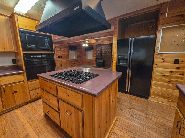1705 Homer Wright Road Talking Rock, GA 30175 - Photo 61 of 98 a kitchen with stainless steel appliances granite countertop a stove a refrigerator and a microwave