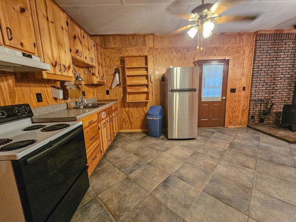 1705 Homer Wright Road Talking Rock, GA 30175 - Photo 69 of 98 a kitchen with stainless steel appliances granite countertop a refrigerator a stove and a sink