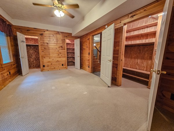 1705 Homer Wright Road Talking Rock, GA 30175 - Photo 74 of 98 an empty room with closet and a ceiling fan