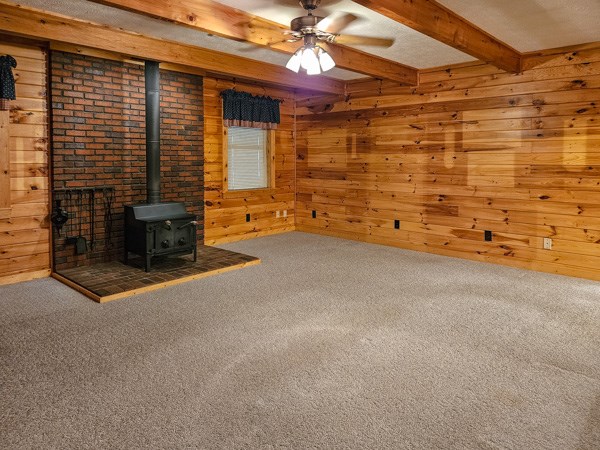 1705 Homer Wright Road Talking Rock, GA 30175 - Photo 89 of 98 a view of an empty room with a brick wall and a fireplace