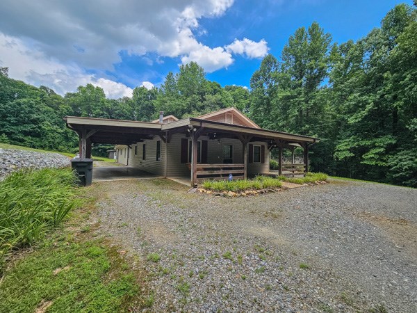 1705 Homer Wright Road Talking Rock, GA 30175 - Photo 95 of 98 a view of a house with a yard and balcony