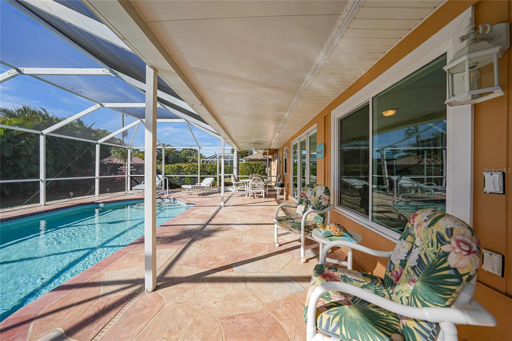 18097 Brazil Avenue Port Charlotte, FL 33948 - Photo 25 of 37 a view of a patio with a backyard