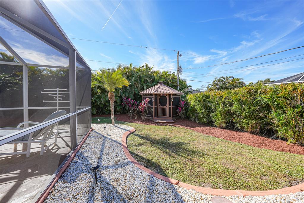 18097 Brazil Avenue Port Charlotte, FL 33948 - Photo 31 of 37 a view of swimming pool with a patio
