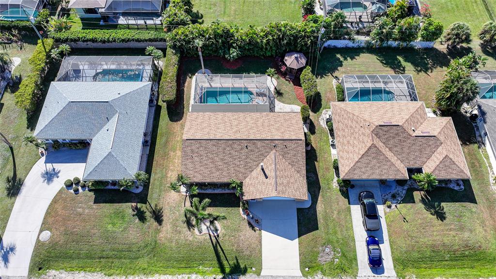 18097 Brazil Avenue Port Charlotte, FL 33948 - Photo 4 of 37 an aerial view of a house with swimming pool