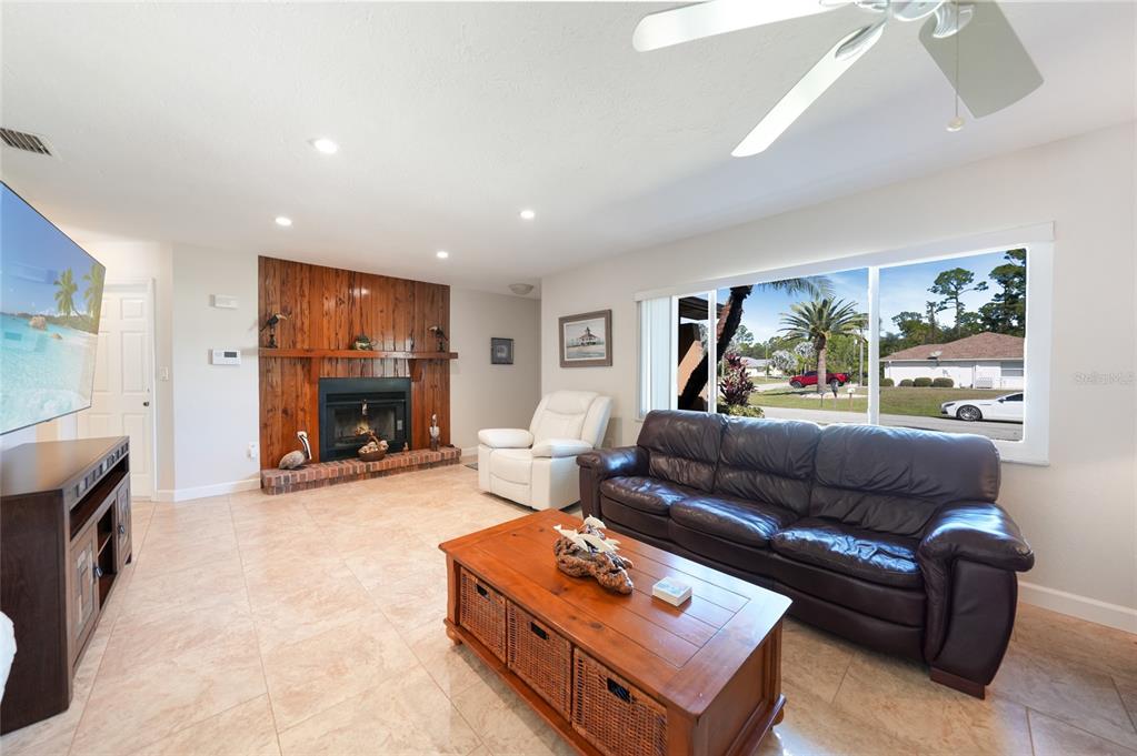18097 Brazil Avenue Port Charlotte, FL 33948 - Photo 5 of 37 a living room with furniture and a couch