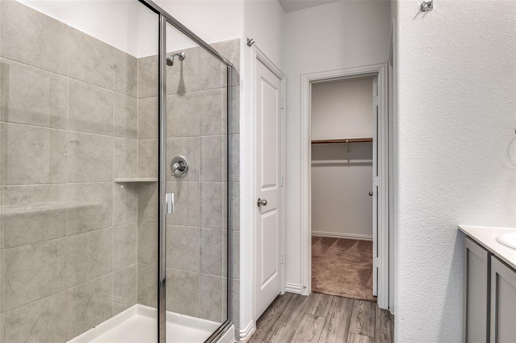 134 Blair Drive Fate, TX 75189 - Photo 16 of 25 a bathroom with a shower