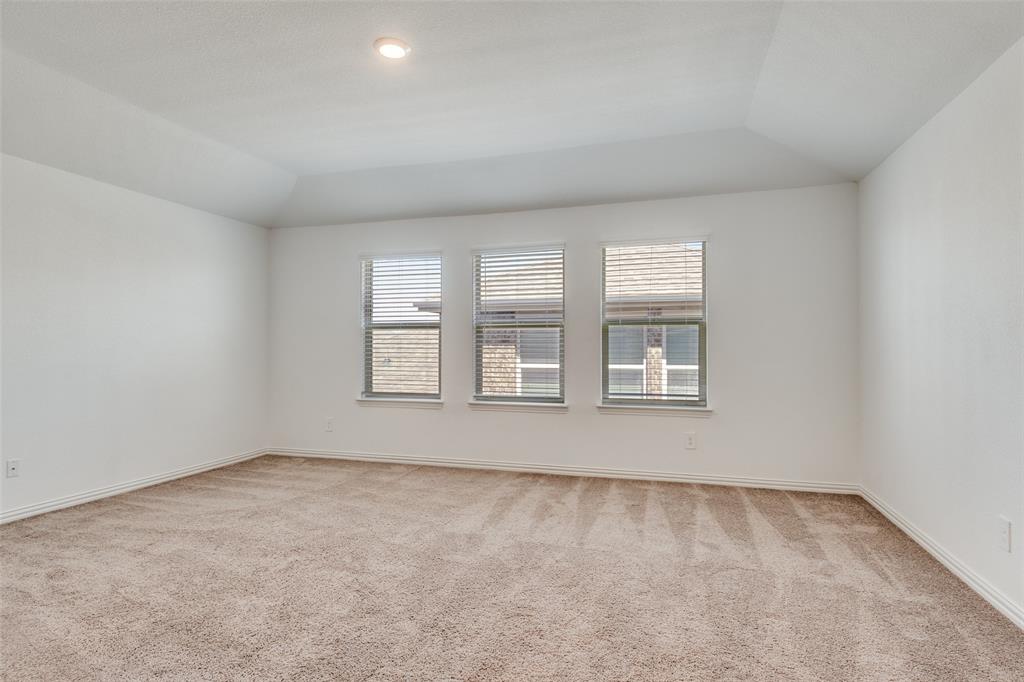134 Blair Drive Fate, TX 75189 - Photo 23 of 25 an empty room with windows